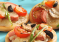 Mini pizzas con queso y verduras
